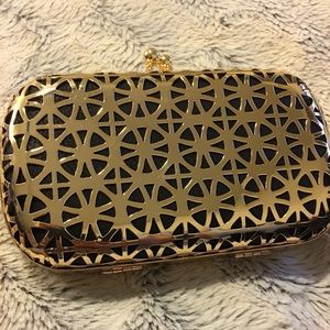 Big Buddha black and gold clutch